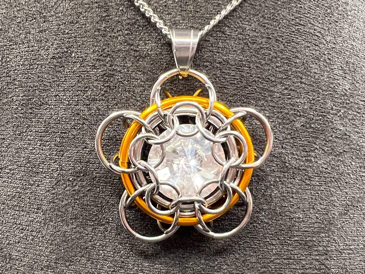 Stainless Steel Chained Daisy Pendant - Orange Accent - Megan Gros Designs